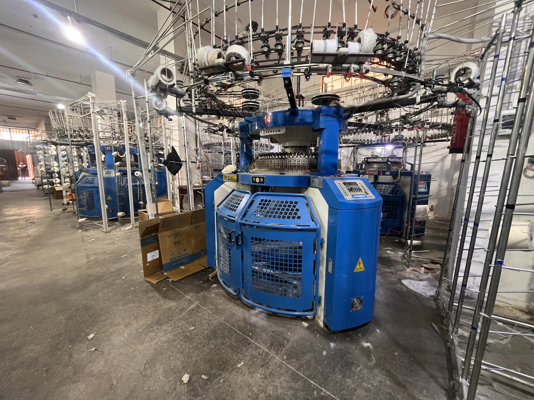 Large industrial spinning machine used for textile yarn production